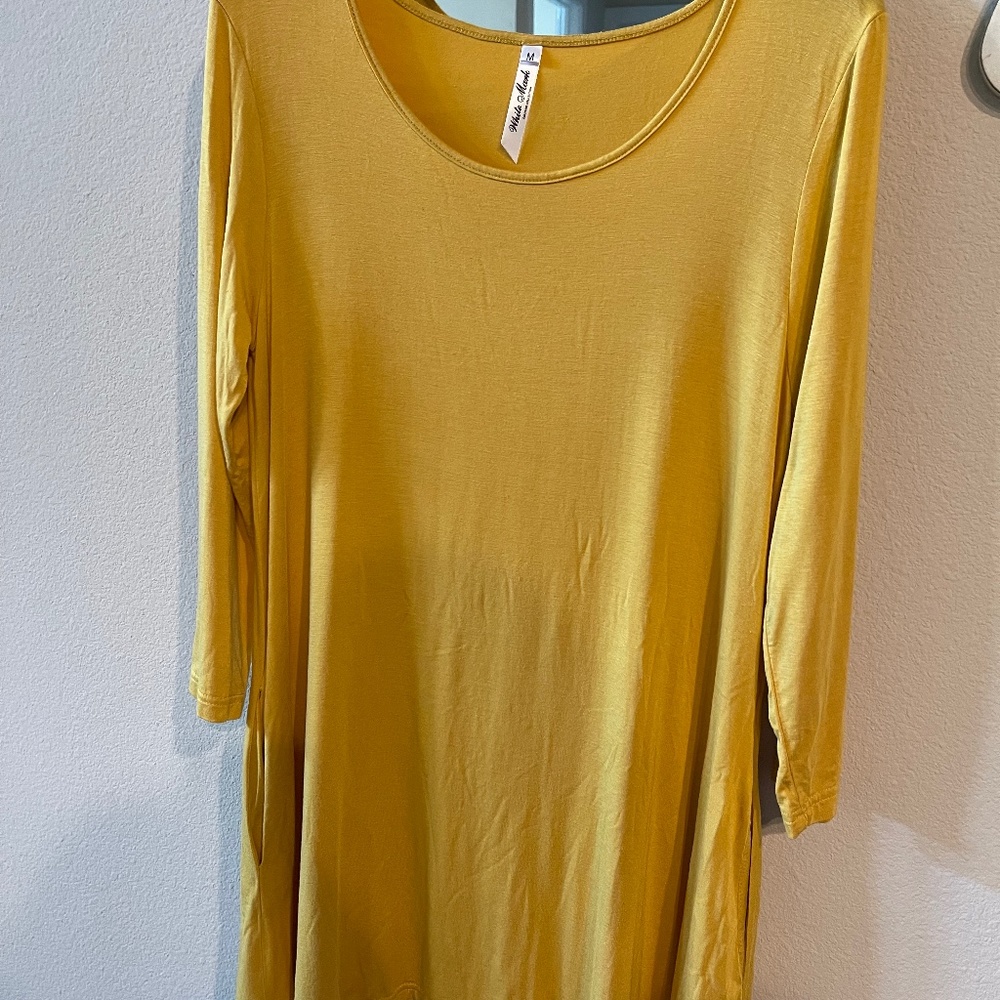 Mustard tunic with two inside pockets on two sides